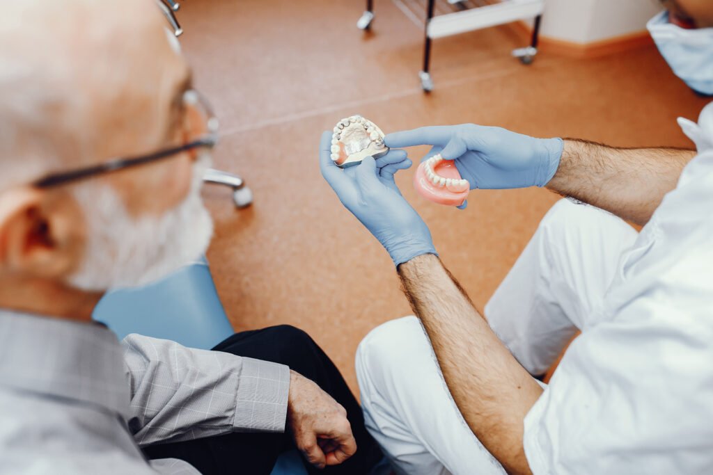 Old man sitting in the dentist's office